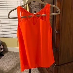 Orange blouse with cutout top